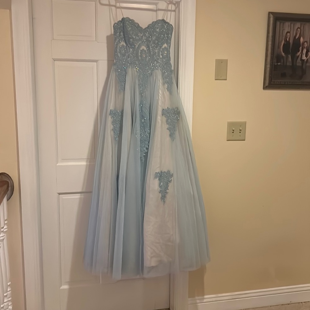 This dress is super cute and classy. Wore this to my junior prom!